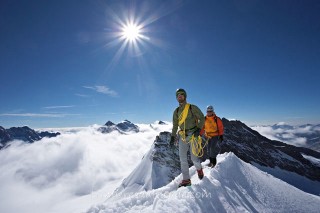 ALPINIST ON THE EAST RIDGE OF  MONSCH, OBERLAND, SWITZELLAND