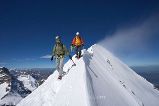 ALPINIST ON THE EAST RIDGE OF  MONSCH, OBERLAND, SWITZELLAND