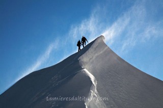 ALPINIST ON THE EAST RIDGE OF MONT-MAUDIT, MASSIF DU MONT-BLANC, HAUTE-SAVOIE, FRANCE