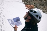 MOUNTAIN GUIDE LOOKINK FOR THE WAY,  MASSIF DU MONT-BLANC, HAUTE-SAVOIE, FRANCE