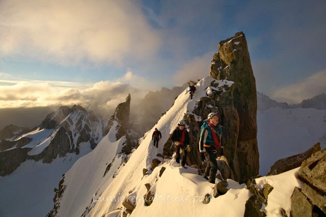 ALPINISTS CLIMBING THE AIGUILLE D'ARGENTIERE, MASSIF DU MONT-BLANC, HAUTE-SAVOIE, FRANCE