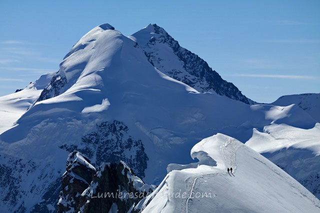 ALPINISTS ON THE RIDGE OF BREITHORN, VALAIS, SWITZERLAND