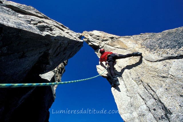 ALPINIST CLIMBING THE GREPON, MASSIF OF MONT-BLANC, HAUTE-SAVOIE, FRANCE