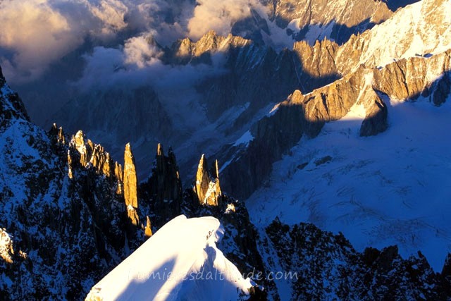 ALPINISTS ON THE ARETE DU MONT-MAUDITAT SUNRISE, MASSIF DU MONT-BLANC, HAUTE SAVOIE, FRANCE