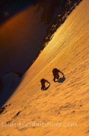 MOUNTAIN GUIDE ON THE NORTH FACE OF LES COURTES, MASSIF DU MONT-BLANC, HAUTE-SAVOIE, FRANCE